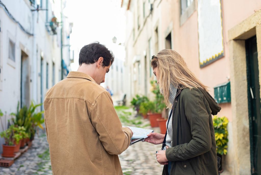 a couple looking at the map